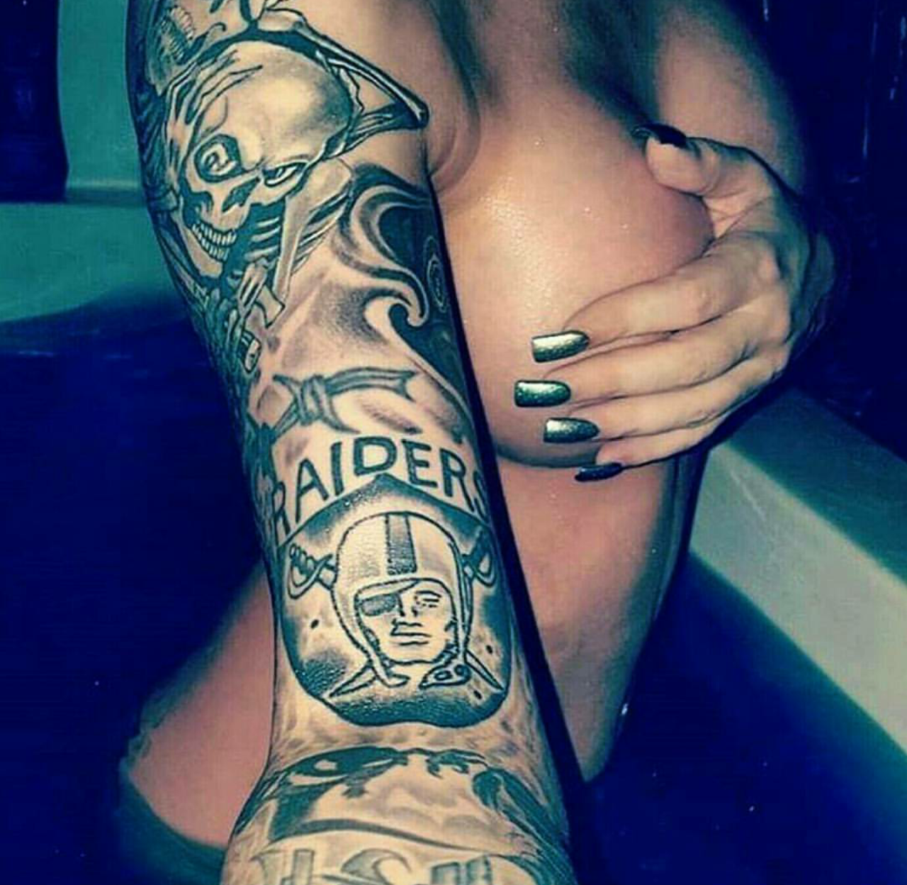 Raiders Fan Arm Tattoo
