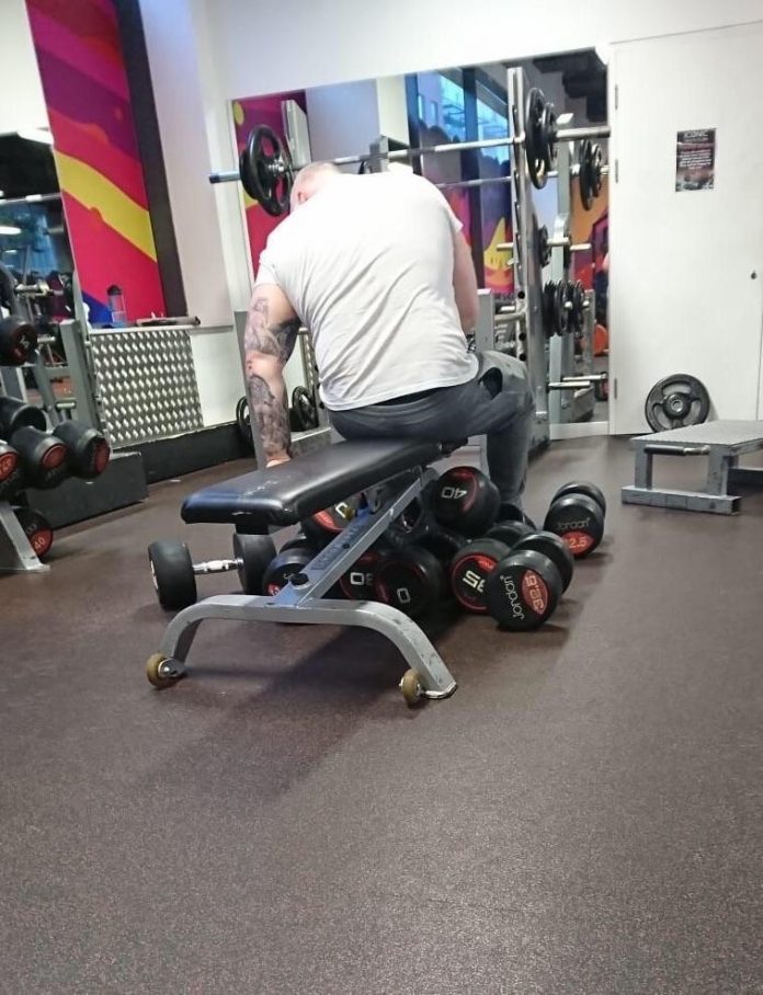 Guy Hoarding Weights