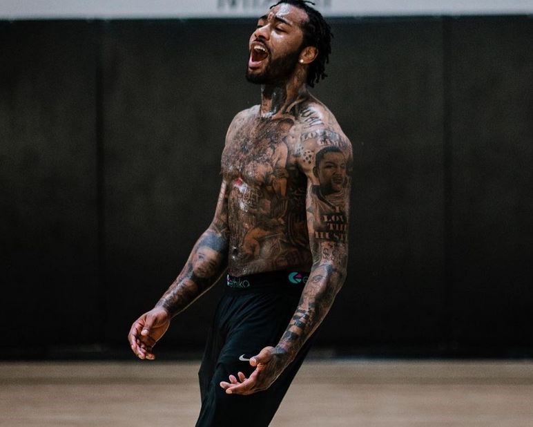 John Wall Chest and Arm Tattoos