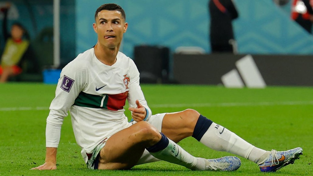 Ronaldo on the ground after being fouled in new soccer cleats