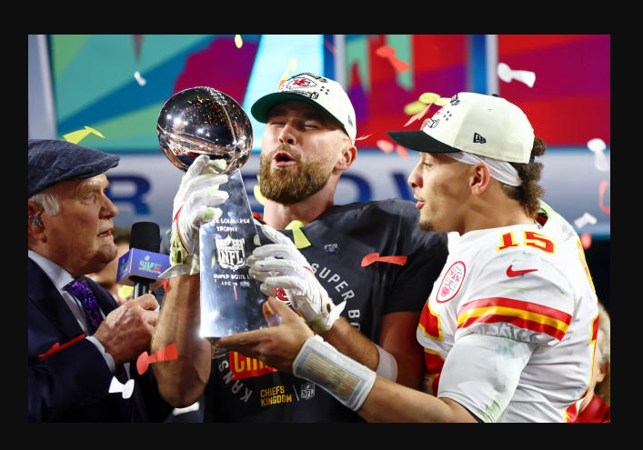 Mahomes and Kelce Trophy Tussle
